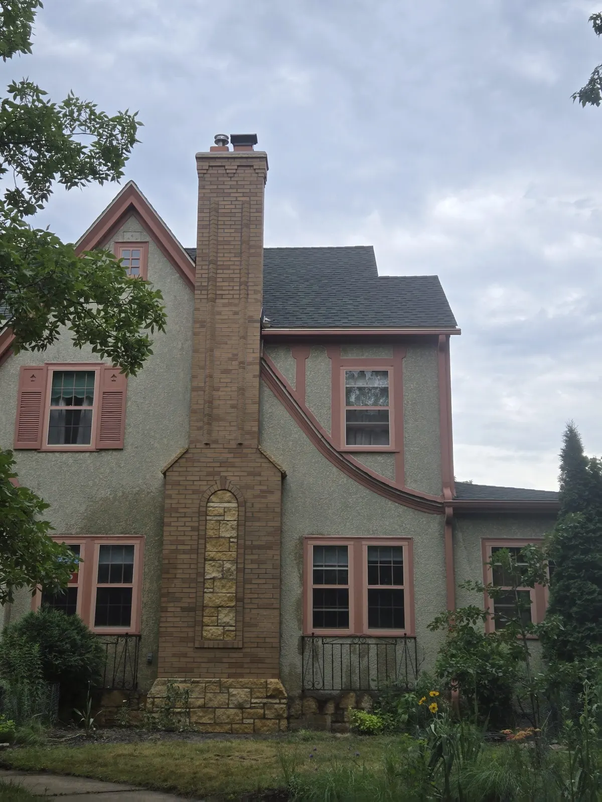 Brick chimney rebuilt above the roofline